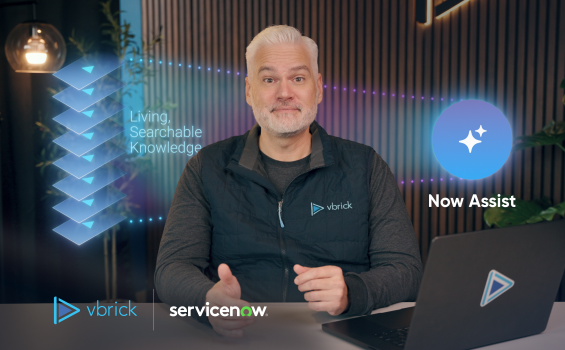 Man seated at desk with laptop