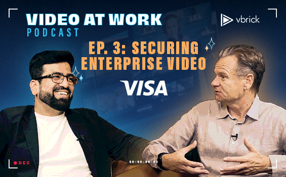 Two men sitting in chairs talking