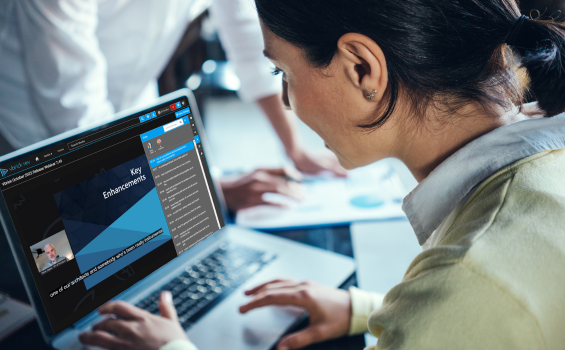 woman works at a laptop