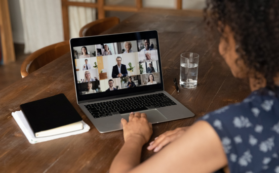 Woman watching a webcast on a laptop